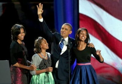 Obama festeggia, Michelle veste italiano