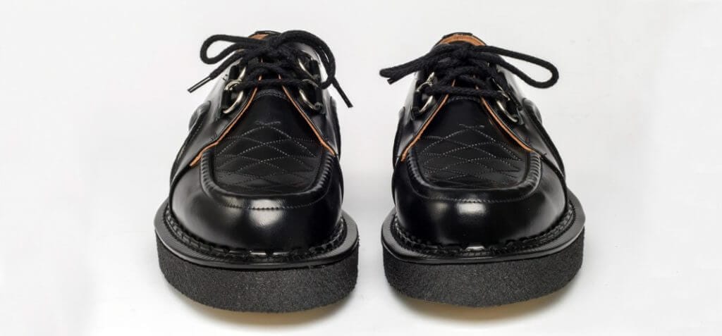 Fred Perry Holdings buys George Cox shoes