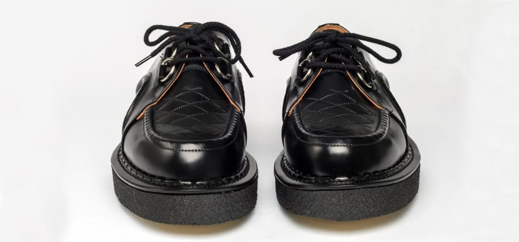 Fred Perry Holdings fa sue le scarpe George Cox